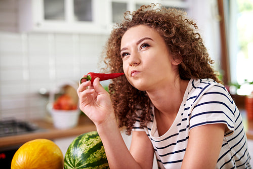 Woman thinking of what to cook