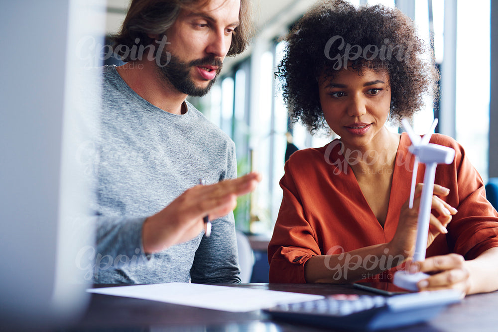 Business couple talking in office meeting