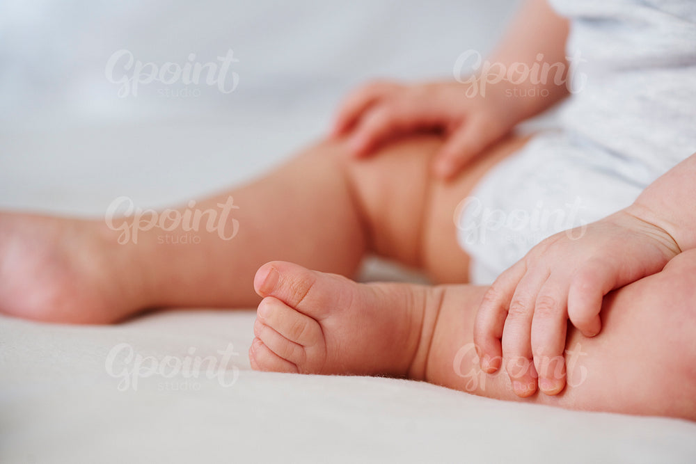 Shot of tiny baby's foot and hand