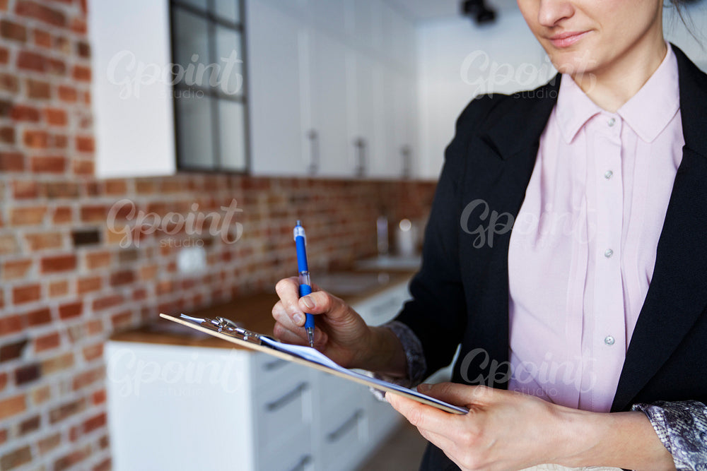 Close up of real estate agent in new apartment