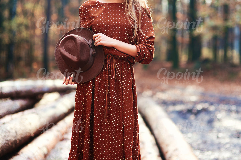 Gorgeous young woman in autumn forest