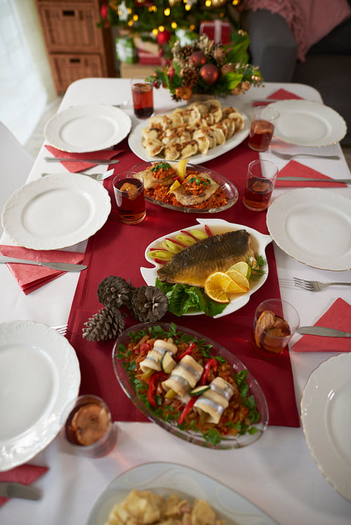 Christmas table full of traditional Polish dishes