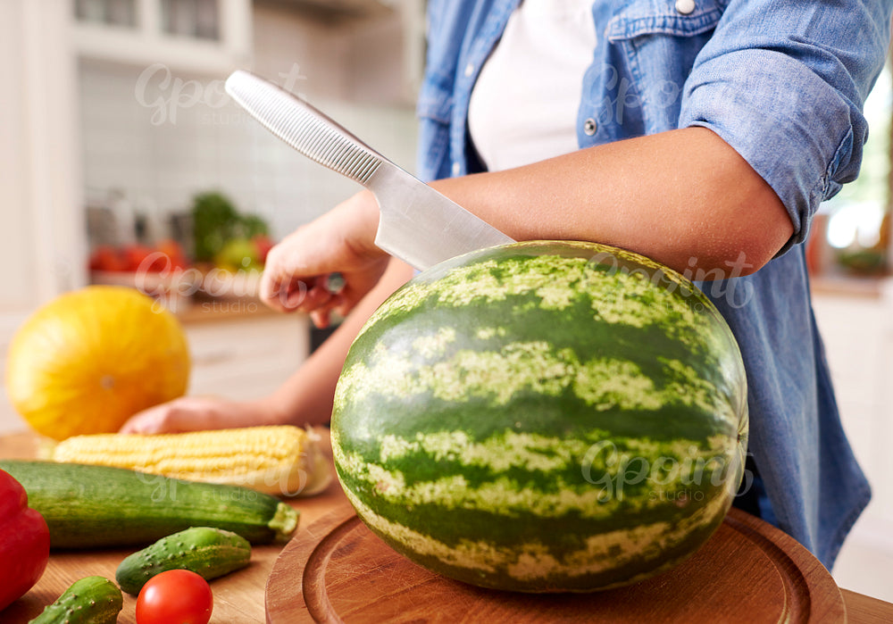 Watermelon and a knife stabbed in