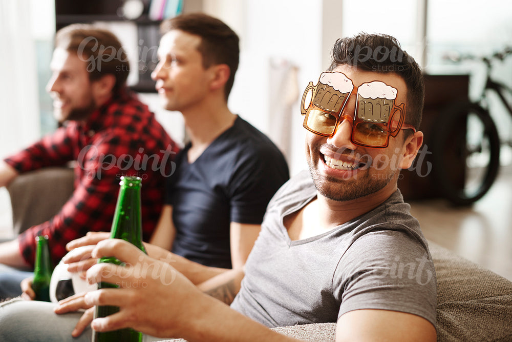 Football fan with funny glasses