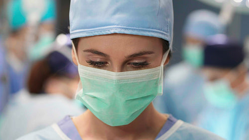 Portrait of female surgeon at operating room