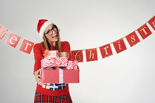 Woman happy to give some Christmas presents