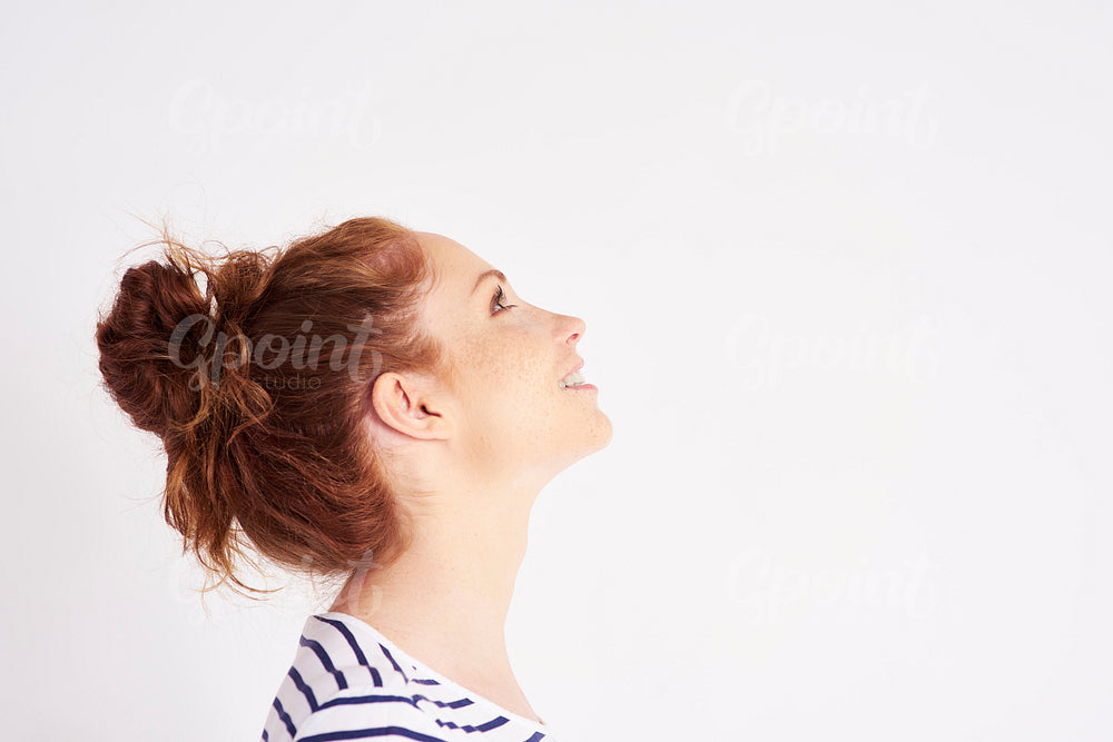 Side view of woman's face at studio shot