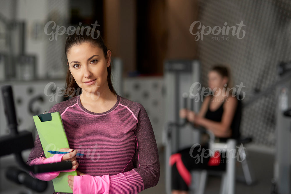 Portrait of personal trainer at the gym