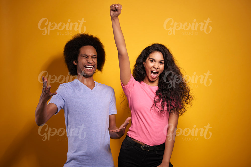 Cheerful couple full of positive emotions