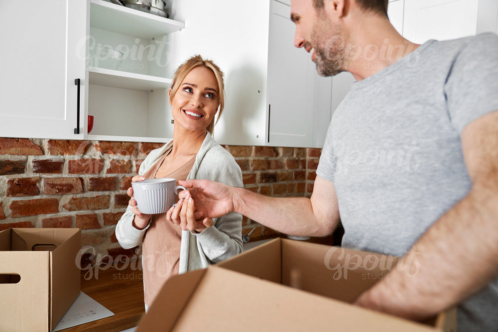 Smiling couple during moving house