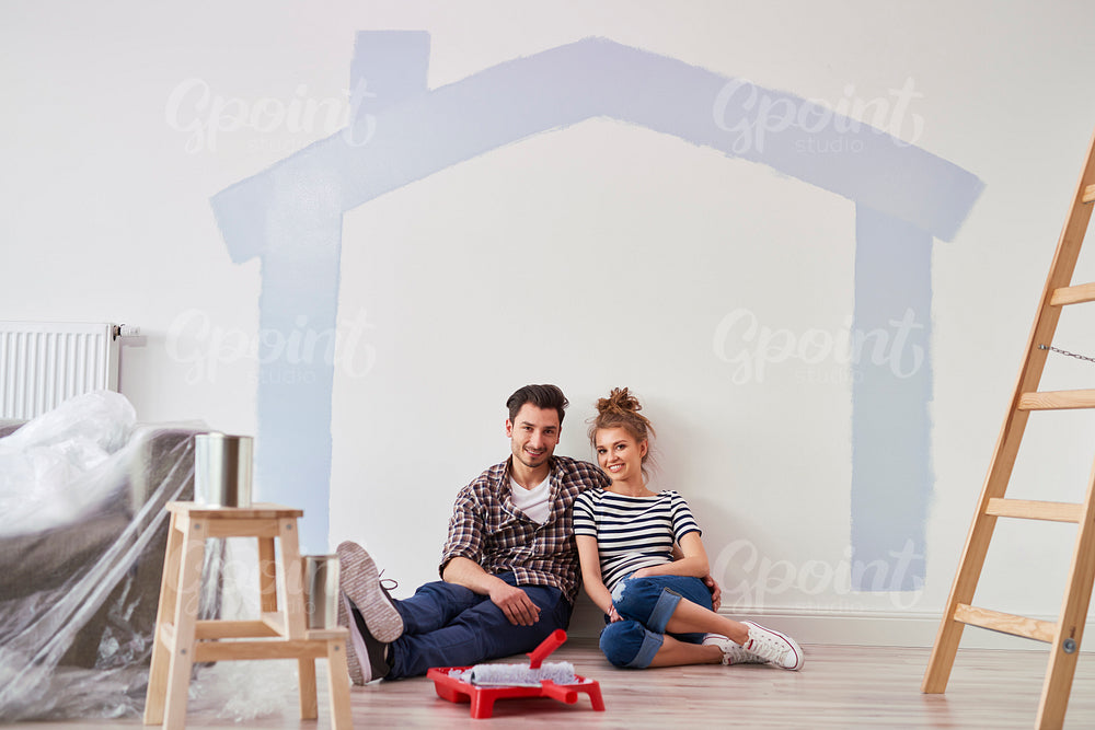 Portrait of couple in their new home