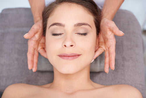 Smiling woman resting at the spa salon