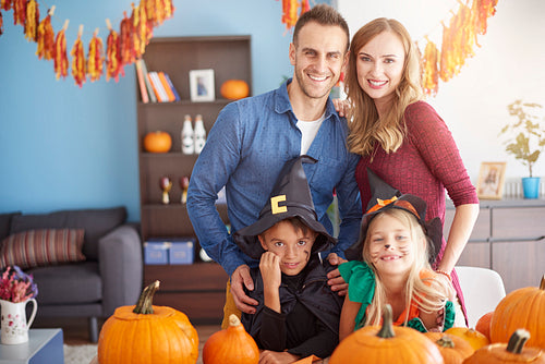 Family spending Halloween together at home