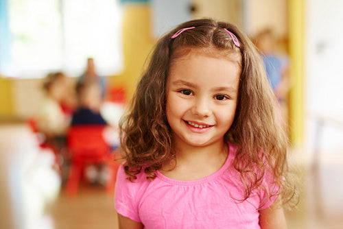 Portrait of smiling preschool girl