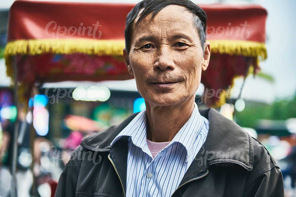 Horizontal portrait of Vietnamese mature man