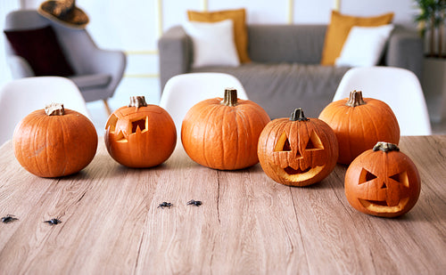 Halloween pumpkins on wooden table
