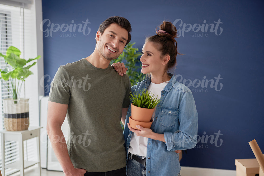 Cheerful couple starting a new life