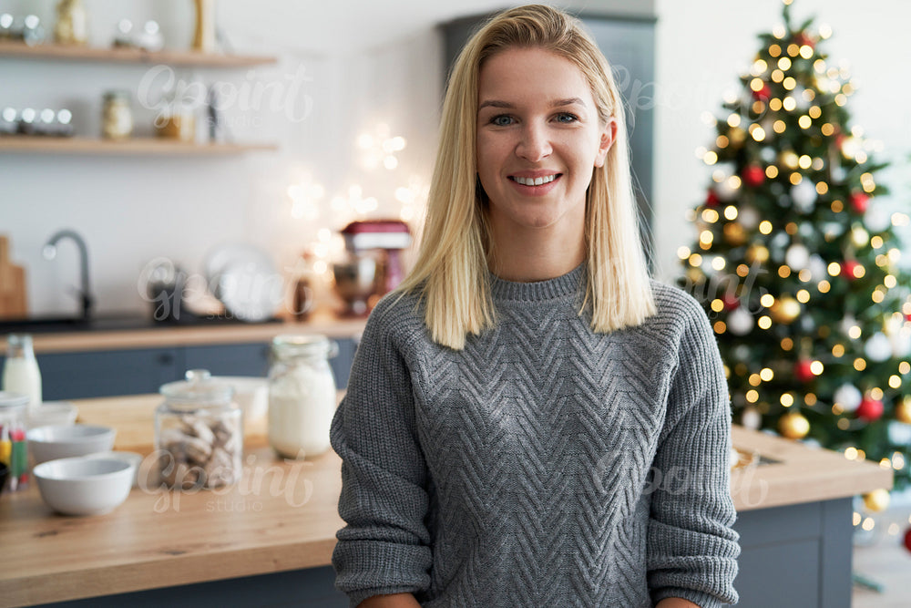 Portrait of woman in the kitchen during Christmas