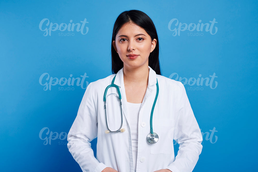 Mid shot portrait of Asian female doctor
