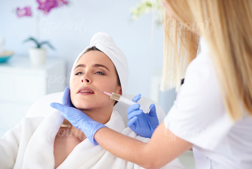 Woman at salon of medical aesthetics