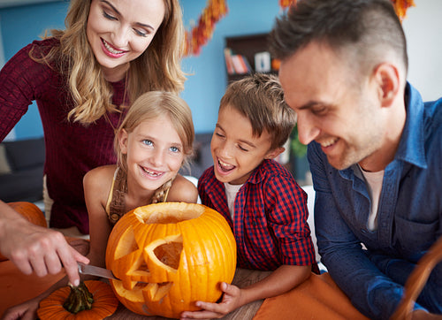 Family having fun together during halloween
