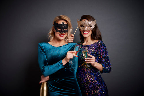 Two women making a toast to New Year