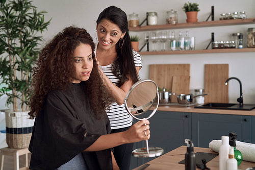 Women during hair beauty treatments at home