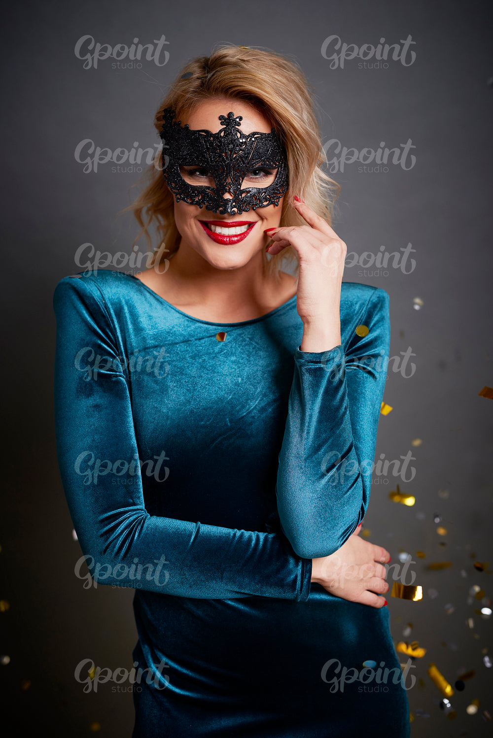 Portrait of beautiful woman with masquerade mask