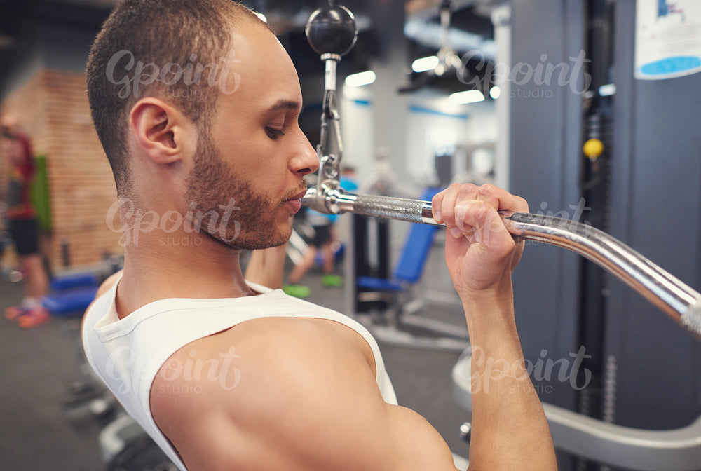 Strong athlete training biceps parts
