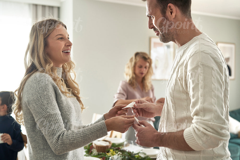 Caucasian couple make best wishes during Christmas Eve