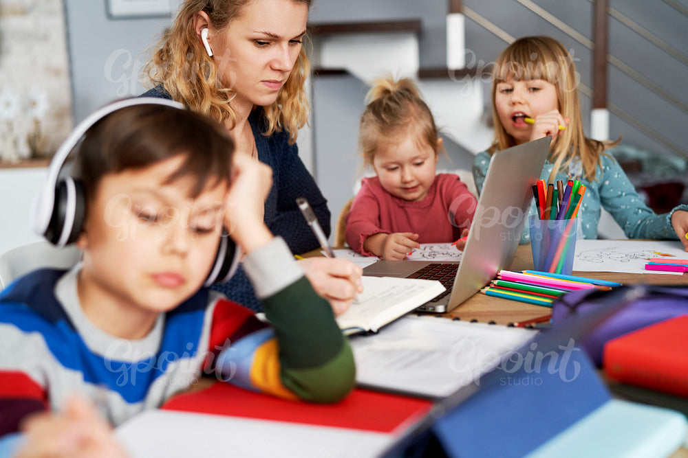 Frustrated mother during home office with children at home