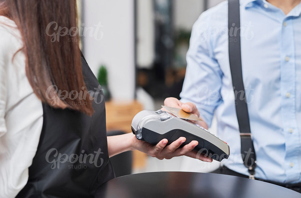 Paying by credit card in hair salon