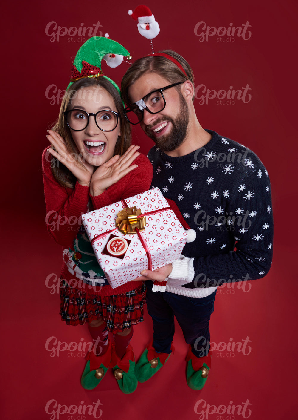 Happy couple with Christmas present