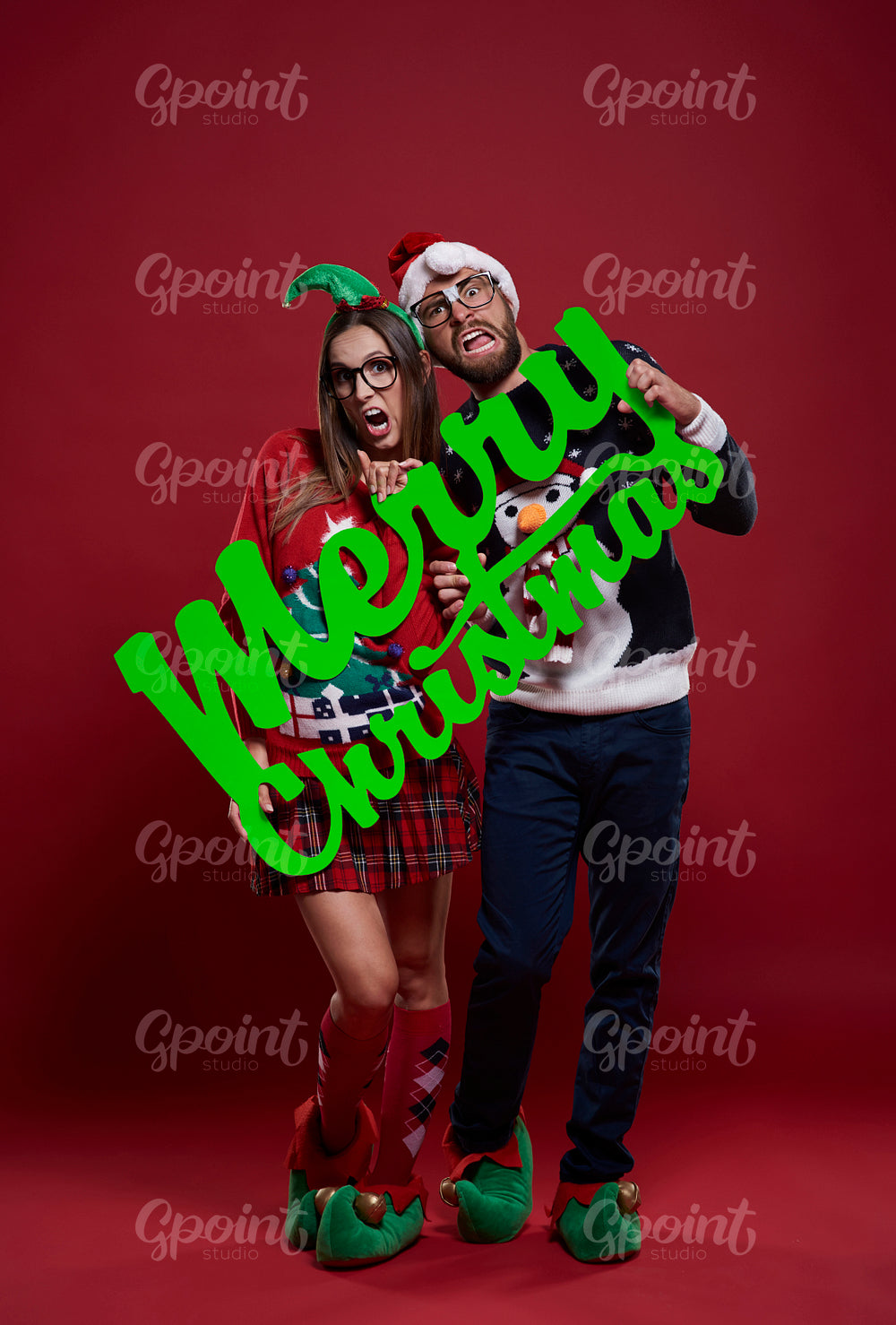 Happy nerd couple in Christmas