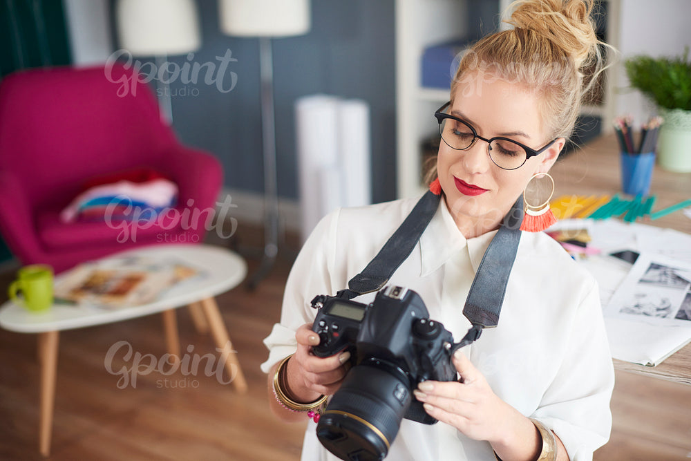 Woman doing the selection of best photos