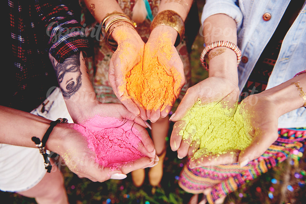 Holi colors in hand of women