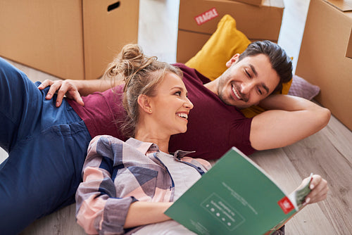 Couple catching a break while moving house