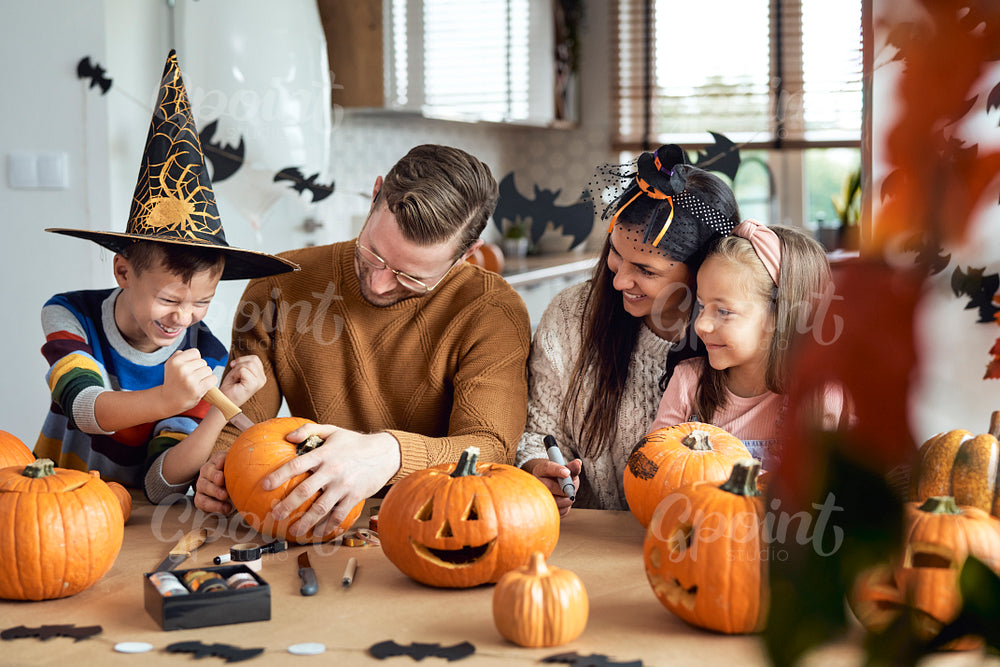 Happy family preparing to Halloween
