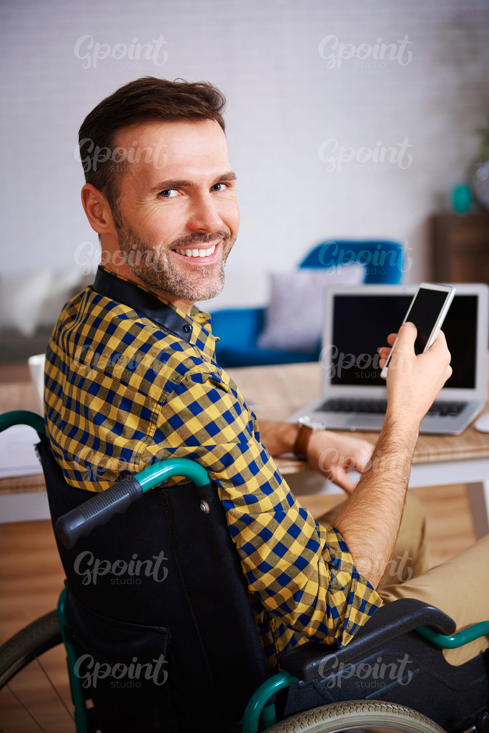 Portrait of disabled businessman in office