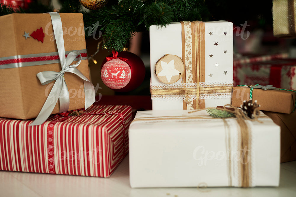 Close up of gifts under Christmas tree