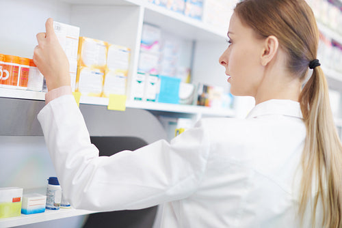 Female pharmacist doing inventory control