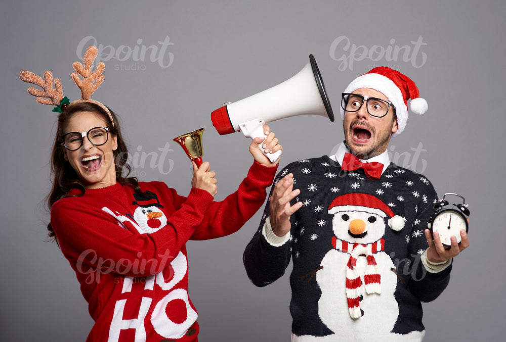Couple announcing the Christmas time