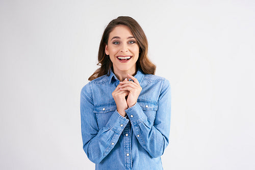 Portrait of excited woman in studio shot