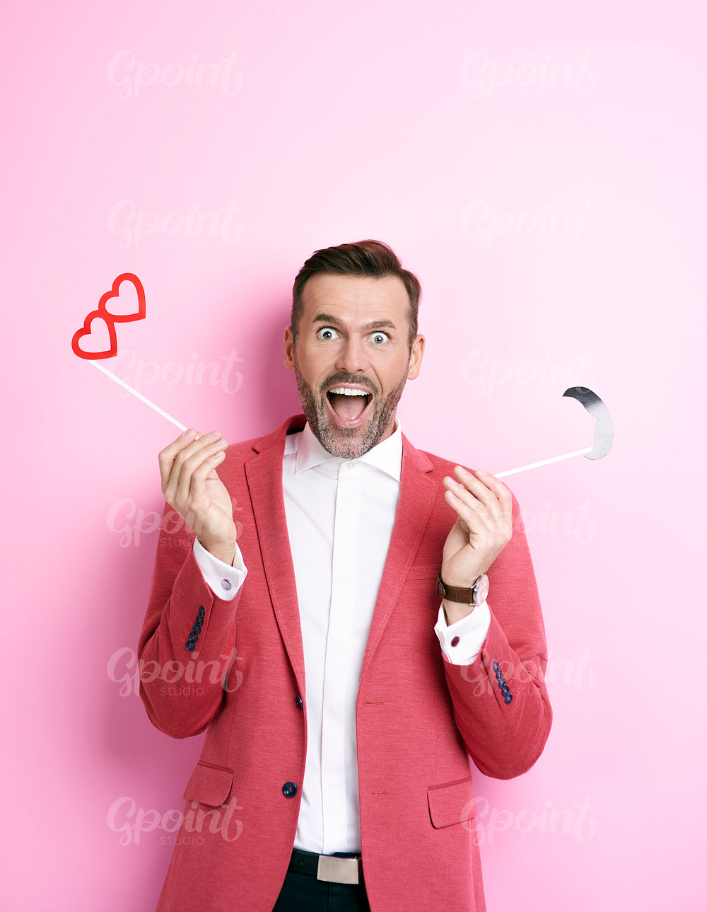 Screaming man  holding valentine monocle