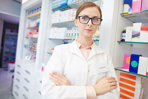 Portrait of confident pharmacist at drug store