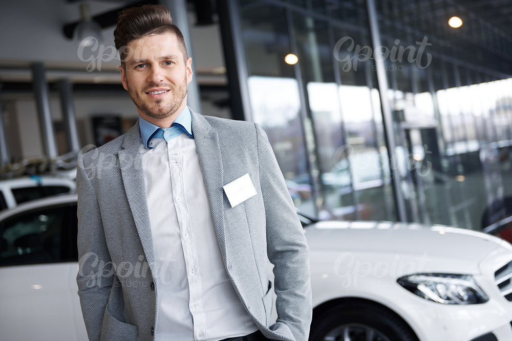 Photography of salesman with hands in pocket