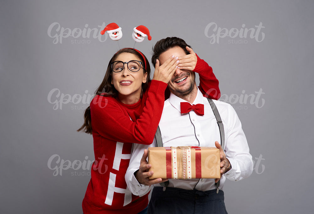 Funny Christmas nerds with gift