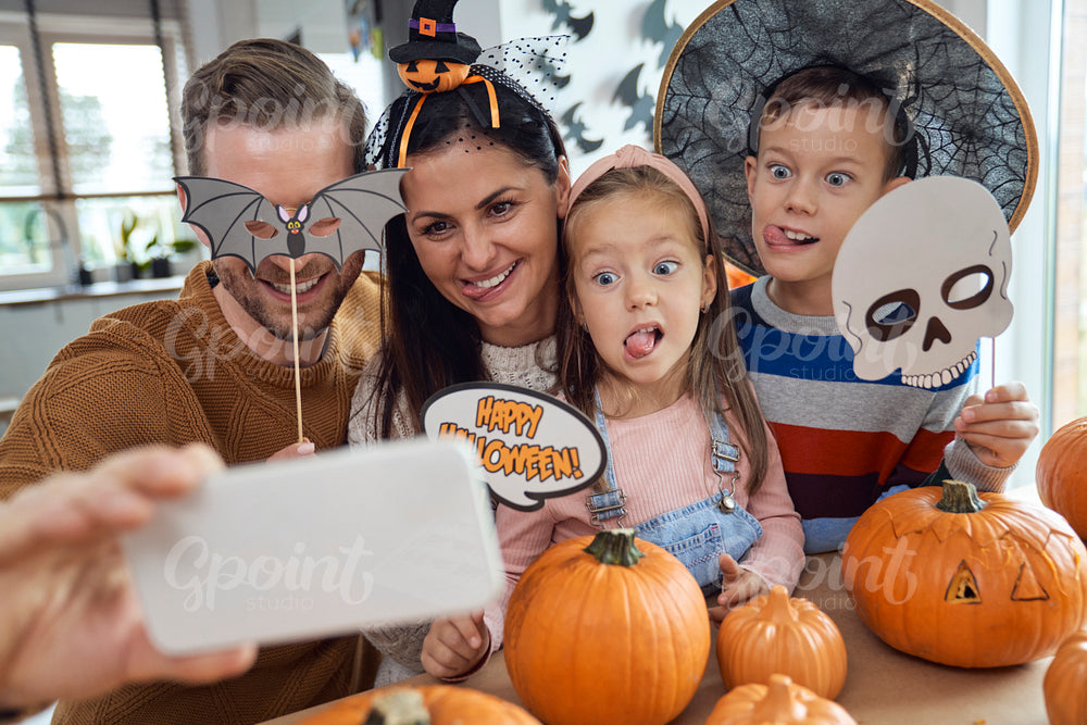 Family making selfie in Halloween