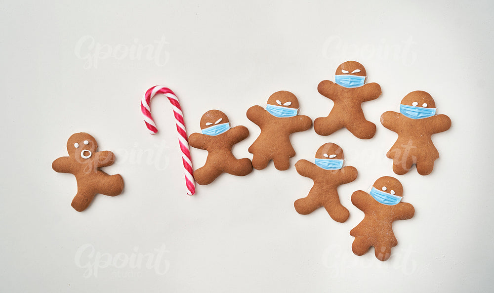 Gingerbread man shaped cookies with facial masks