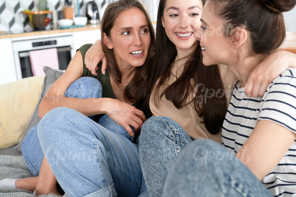 Three best friends spending time at home together